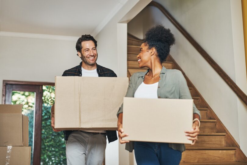 A young couple who ahave mortgage questions first-time buyers always ask